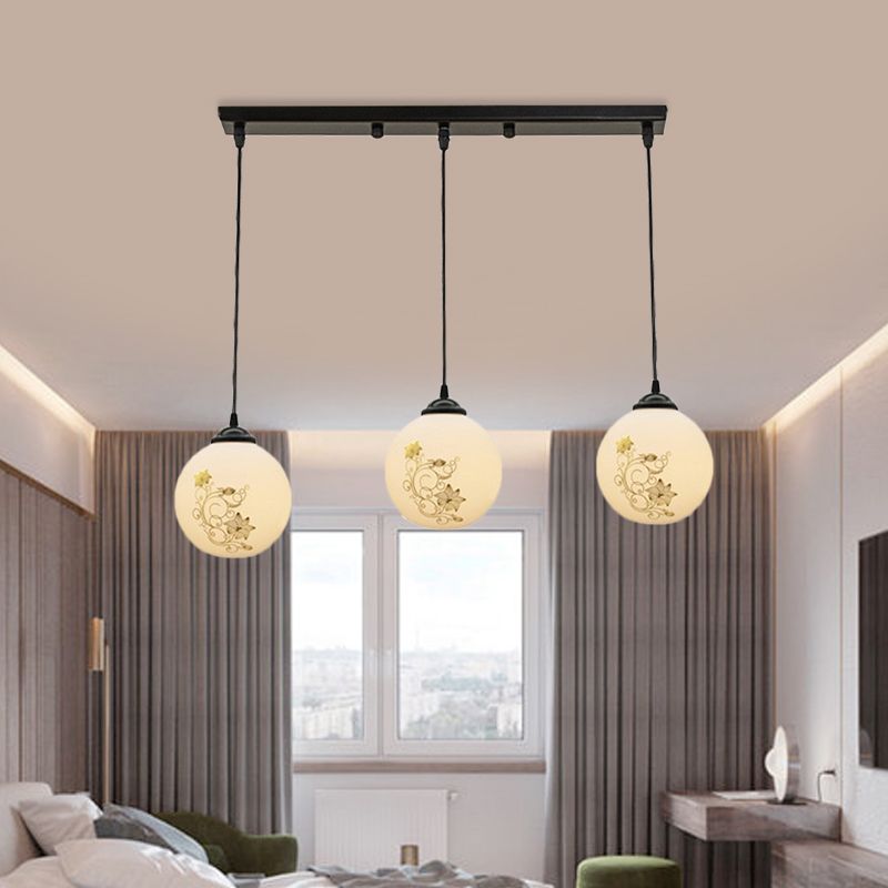 Black Sphere Multi Ceiling Lamp Modernism White Printing Glass 3-Light Dining Room Pendant with Round/Linear Canopy