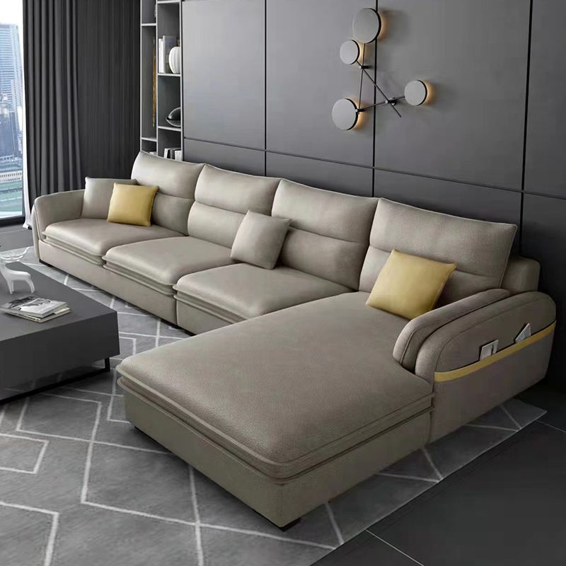Contemporary Right Hand Facing Sectional with Pillowed Back Cushions for Four People
