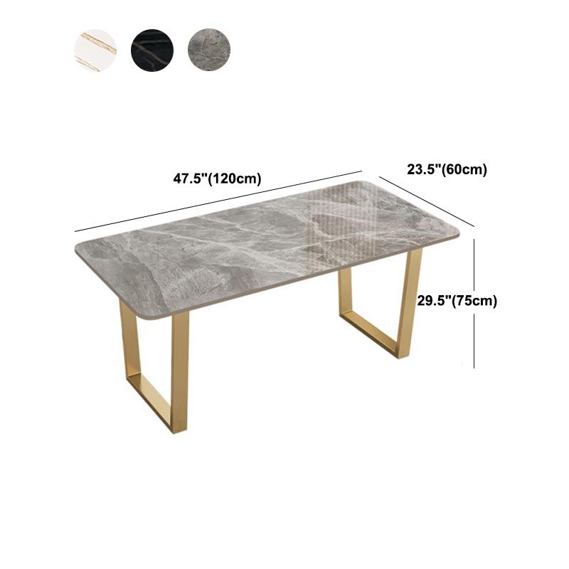 Mesa de cocina rectangular de lujo con superficie de piedra sinterizada y pedestal doble en dorado