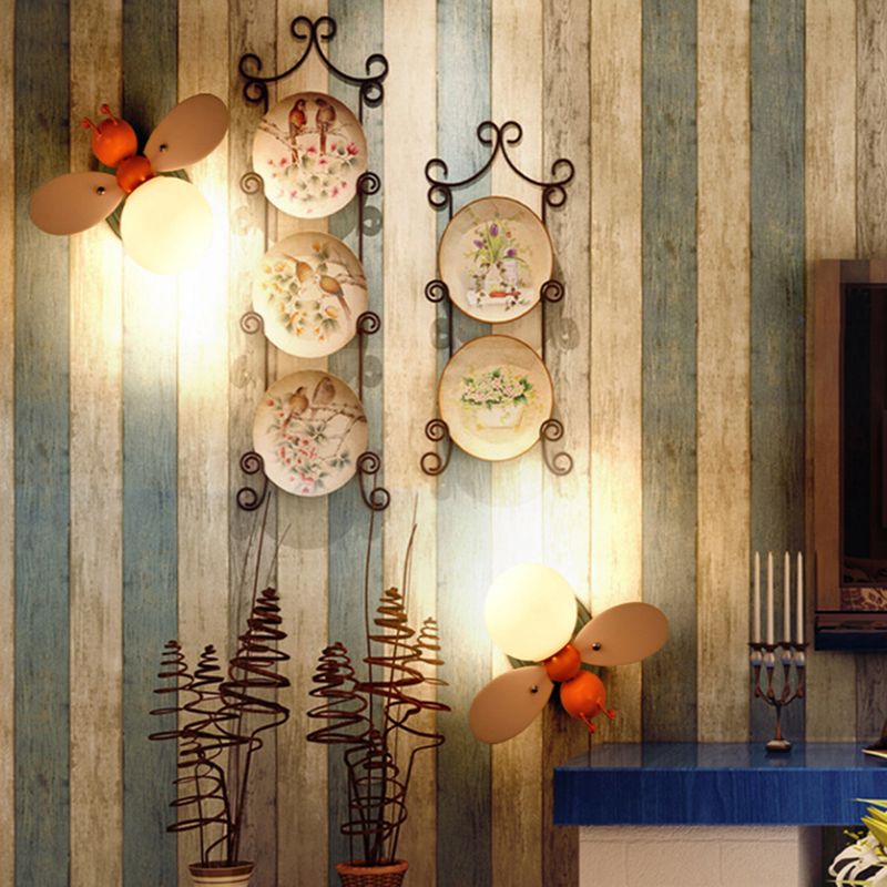 Bee Shaped Child Room Sconce Lighting Metallic Single Modern Wall Light with Globe Cream Glass Shade in Yellow