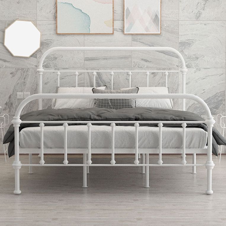 Luxurious Standard Bed with Open-Frame Headboard and Metal Legs