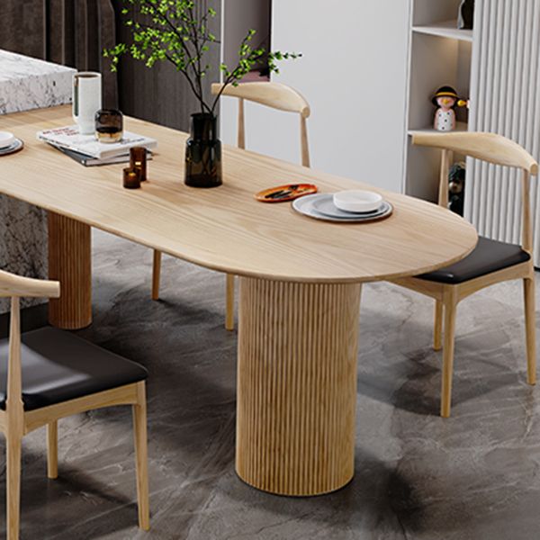 Table à manger de forme libre Table en bois massif contemporaine avec 3 pieds