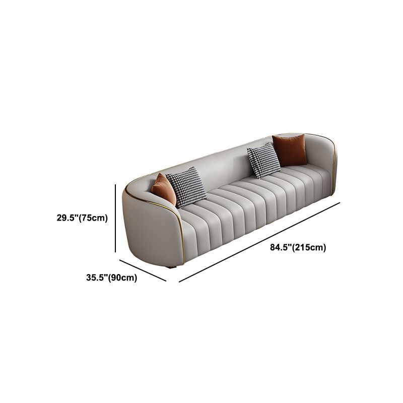 Genuine Leather Sloped Arm Sofa Modern Beige Sofa with Pillows