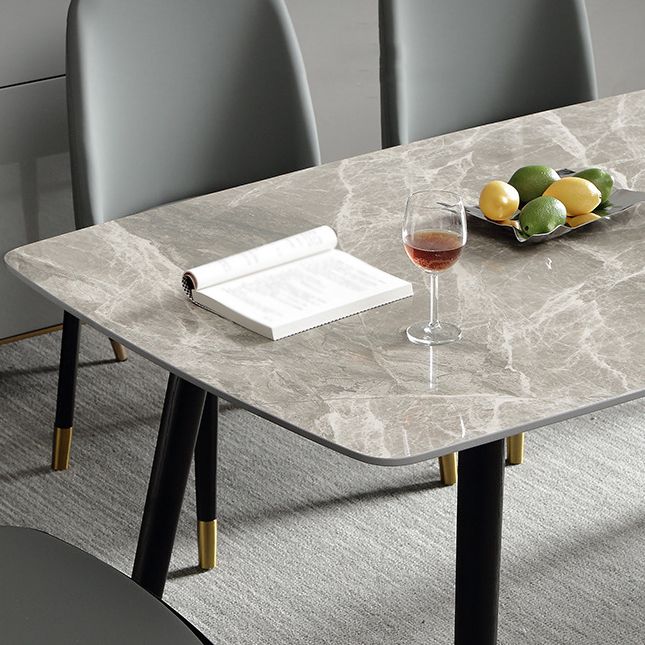Mesa de comedor de piedra con 4 piernas negras