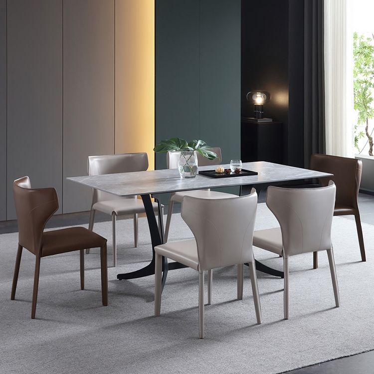 Silla lateral de comedor de cuero de estilo diseñador Silla de comedor Wingback para uso doméstico