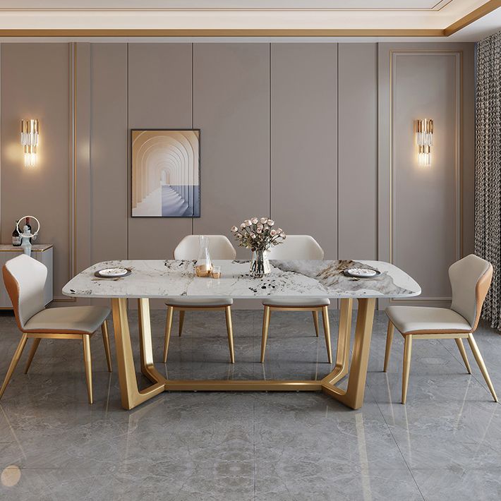 Mesa de comedor de piedra sinterizada de lujo tradicional mesa rectángulo con base de caballete dorado