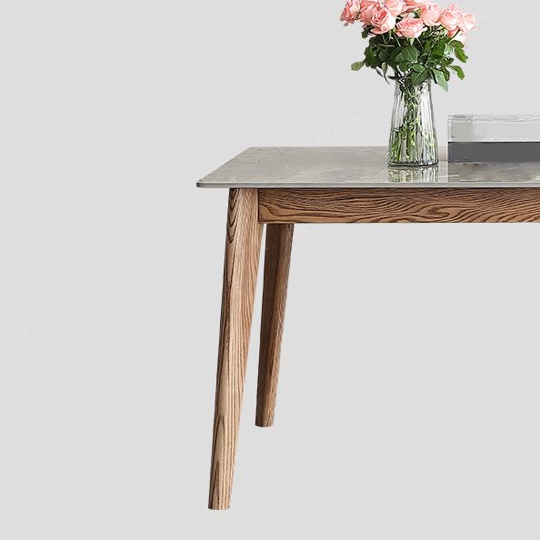 Mesa rectangular con tapa de piedra sinterizada en mesa de cocina gris con base de madera y 4 patas