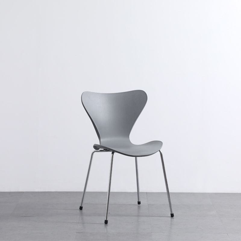 Sillas laterales sin brazos modernas con 4 patas de acabado negro sillas sólidas de plástico para uso doméstico