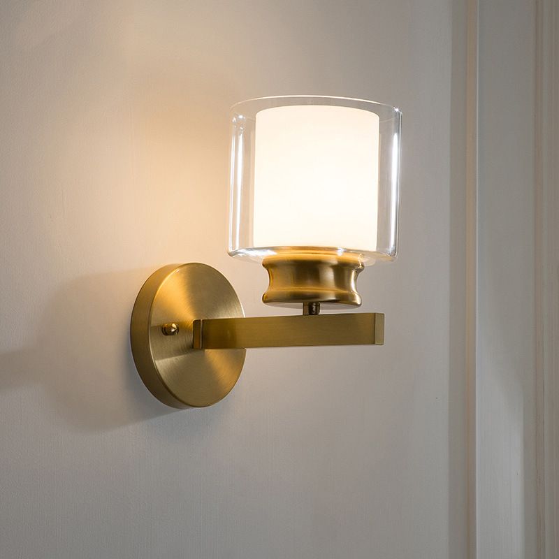 Modern Style Cylindrical Wall Sconce 1 Light Clear and White Glass Wall Mount Lamp in Brass for Bedroom