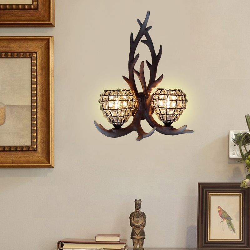 Resin Antler Wall Lighting Country 2-Light Bedroom Sconce Light Fixture in Brown/Gold with Globe Crystal Shade