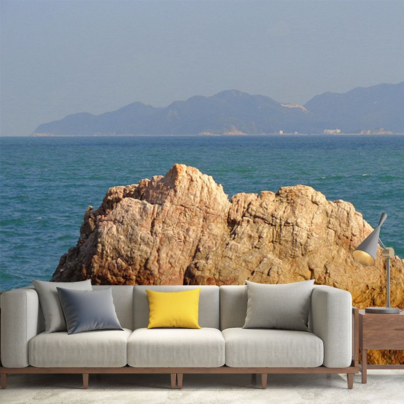 Sea Behind Stone Scenery Mural Contemporary Smooth Surface Wall Covering in Brown