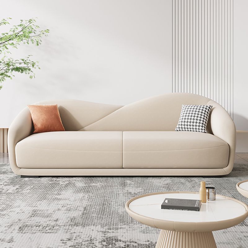Contemporary Sloped Arm Curved Sofa Sewn Pillow Back Sofa for Living Room