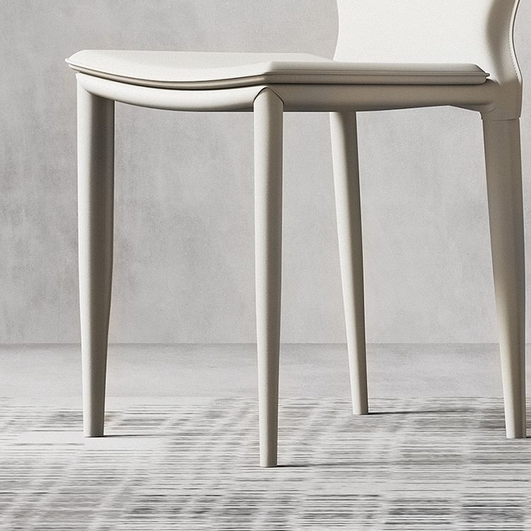 Sillas laterales contemporáneas sin brazos con respaldo sólido Sillas de comedor de cuero