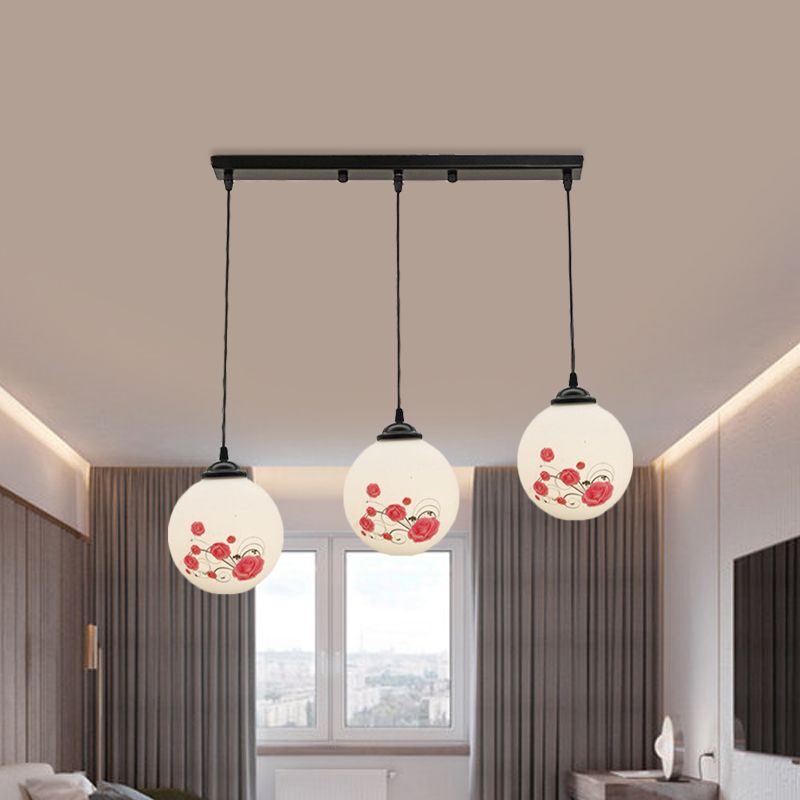 3 Heads Orb Multi-Pendant Modernism Black Finish White Frosted Glass Hanging Light Kit with Flower Pattern and Round/Linear Canopy