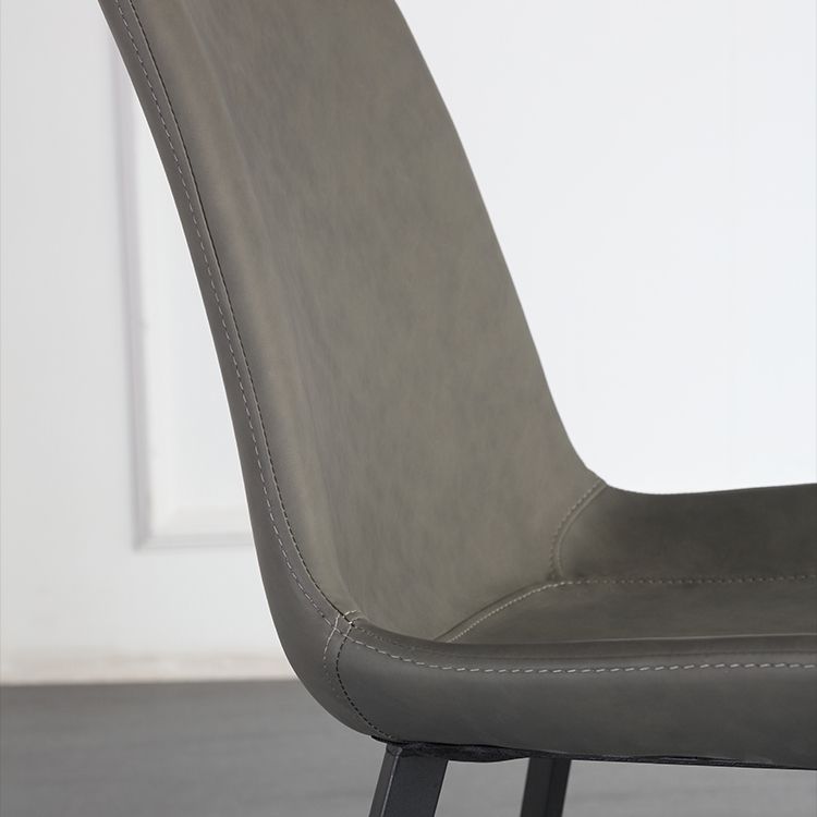 Sillas de comedor de cuero estilo moderno con respaldo macizo y 4 patas negras (juego de 2)