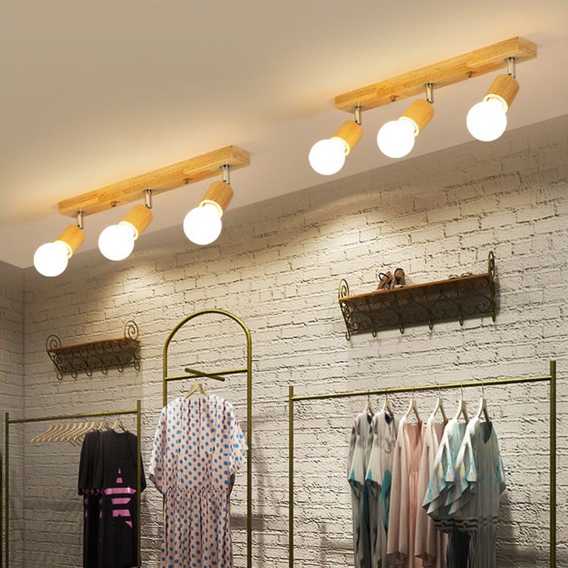 Lámpara semi empotrada de madera minimalista con iluminación de riel con forma geométrica