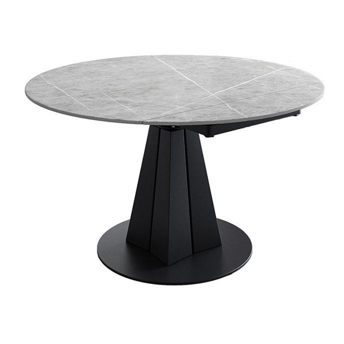 Table de salle à manger en pierre fritrée de style moderne avec base en métal