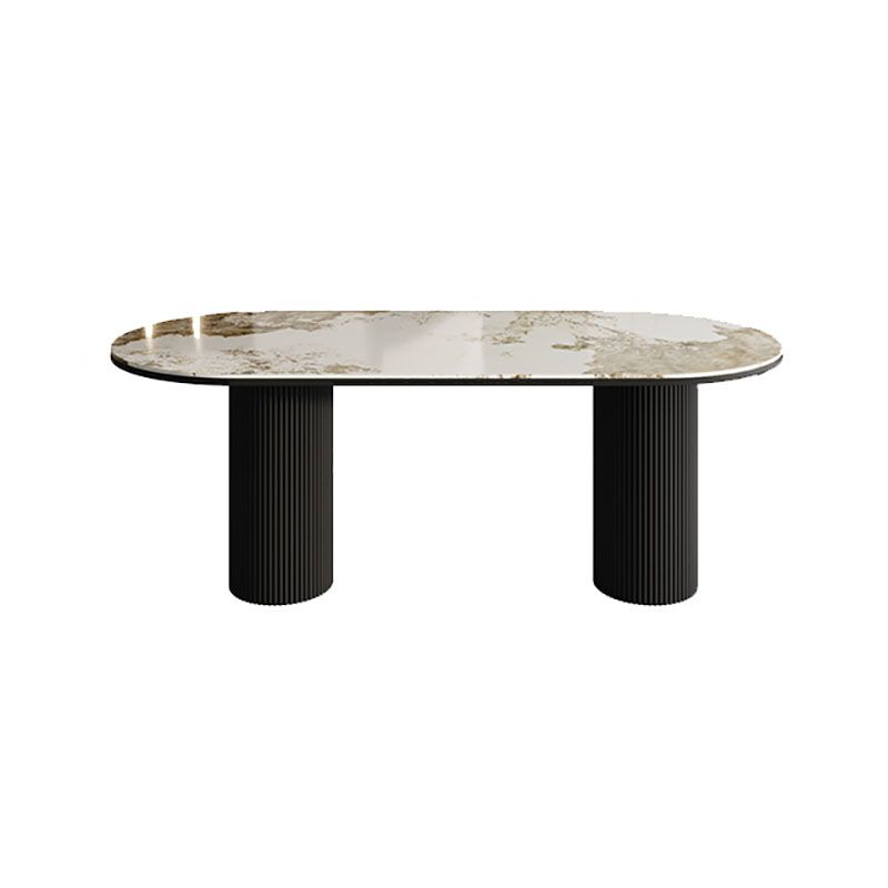 Table de salle à manger ovale moderne avec dessus en pierre et double piédestal en métal