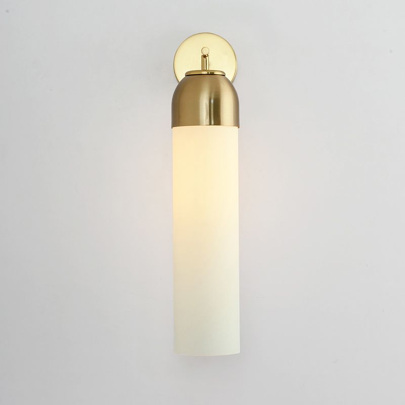 Crema de apliques tubular modernista/vidrio verde 1 cabezal accesorio de iluminación de pared de sala de estar con brazo de metal