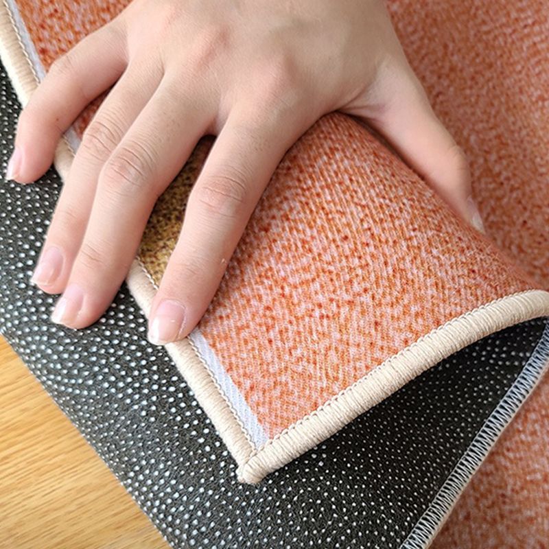 Tapis lavable de tapis en polyester à tapis à moquette orange pour le salon