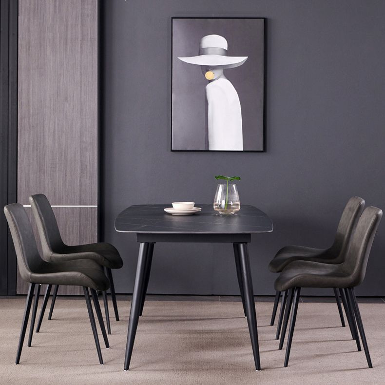 Table à manger rectangulaire en pierre fritrée contemporaine avec une table de base à quatre jambes en noir