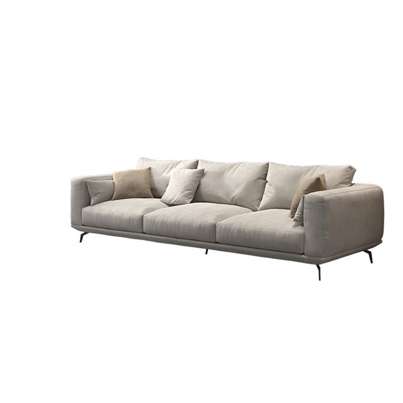 Contemporary Faux Leather Pillows Back Sofa with Tuxedo Arm in Beige