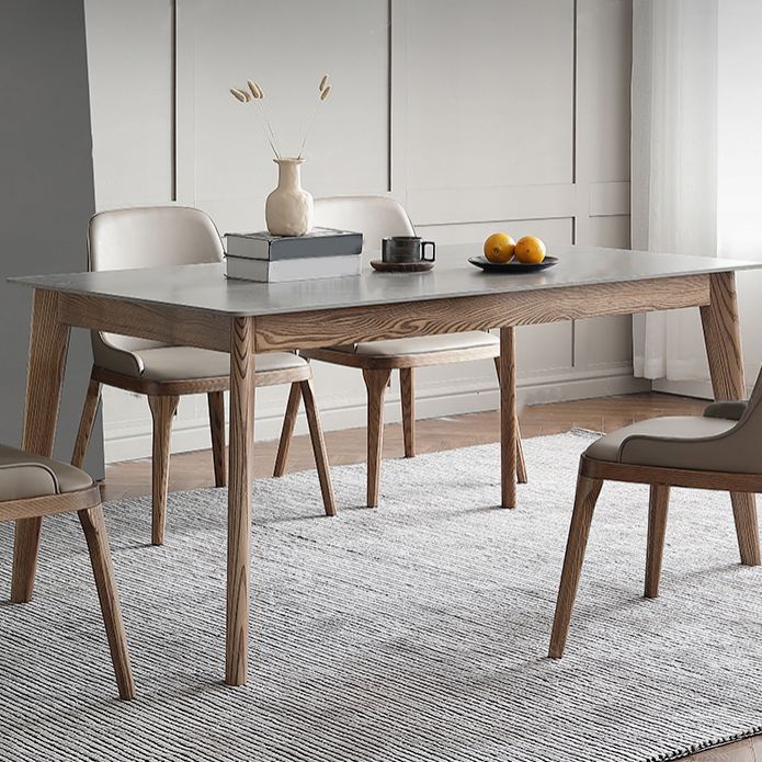 Mesa rectangular con tapa de piedra sinterizada en mesa de cocina gris con base de madera y 4 patas