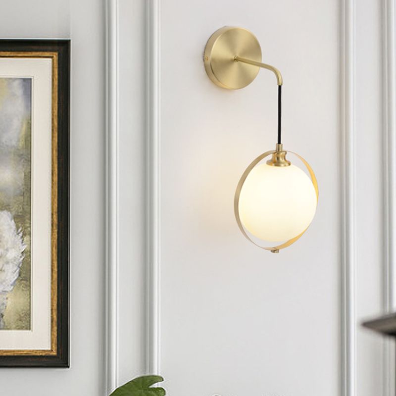 White Glass Ball Sconce Light Modernism 1 Bulb Brass Wall Mount Lamp with Curved Arm