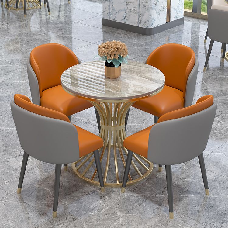 Eenvoudige stijl thuis gesinterde stenen eettafel ronde vormtafel met metalen voetstukbasis