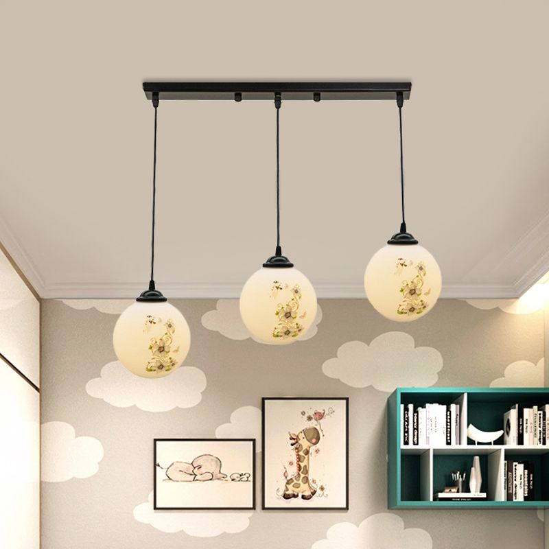 Black Sphere Multi Ceiling Lamp Modernism White Printing Glass 3-Light Dining Room Pendant with Round/Linear Canopy