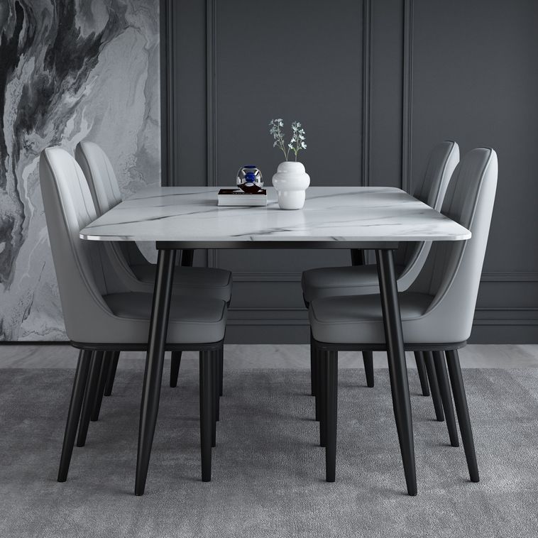 Einfachheitstil Home Sintered Stone Esstisch 4 Beine Kohlenstoffstahl Basis Rechtecktisch