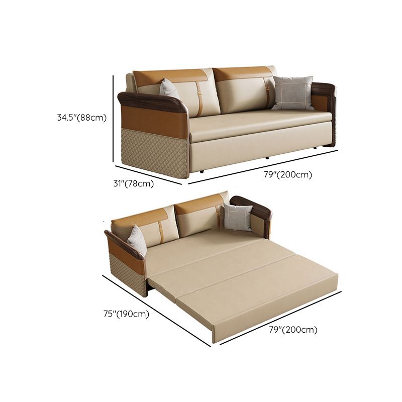 Contemporary Bonded Leather Sleeper Sofa with Pillow Back and Flared Arms