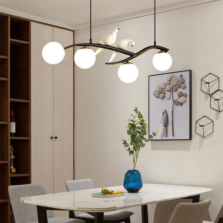 Glass Globe Island Light in Modern Singularity Wrought Iron Pendant Light with Resin Bird Decoration