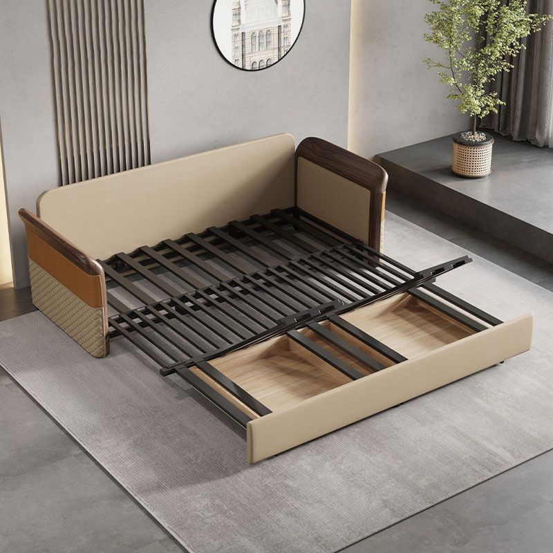 Contemporary Bonded Leather Sleeper Sofa with Pillow Back and Flared Arms