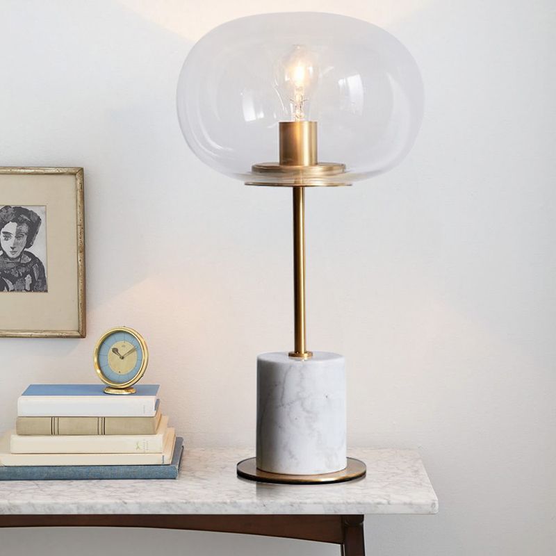 Luce notturna ovale in vetro trasparente minimalista 1 lampadina Illuminazione da tavolo in ottone e bianco con base cilindrica in marmo
