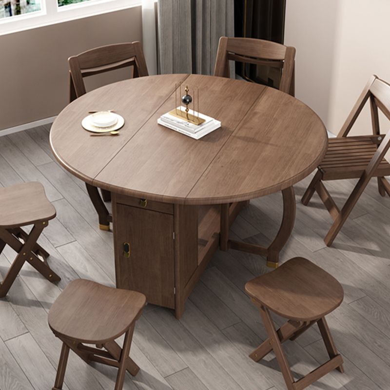 Table à manger pliable en bois d'hévéa, table ronde moderne et médiévale avec base sur tréteau de rangement
