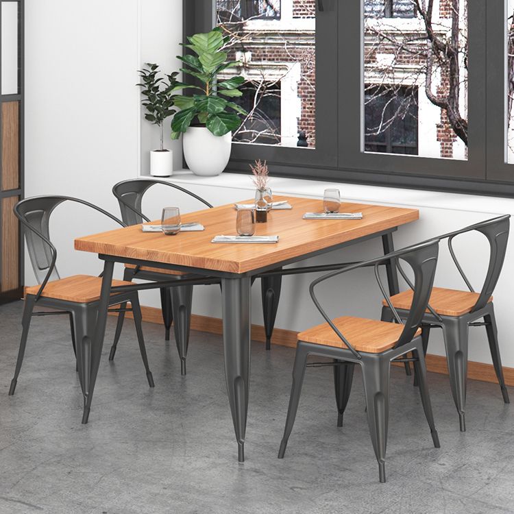 Mesa de comedor de madera sólida Mesa de comedor industrial de 4 patas con base de metal