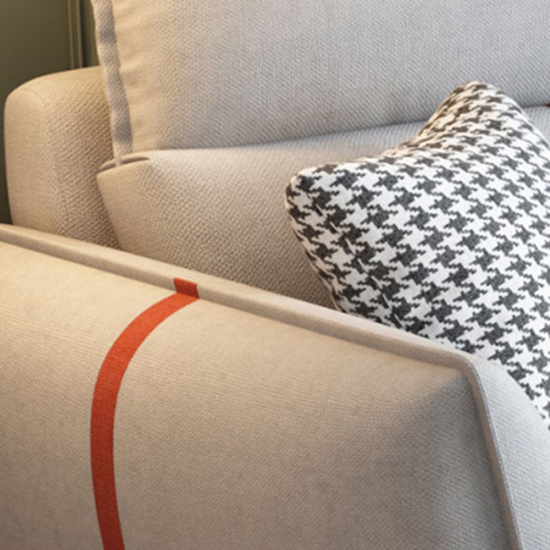 Fabric Pillow Back Sectional Flared Arm Sectional with Wood Accents