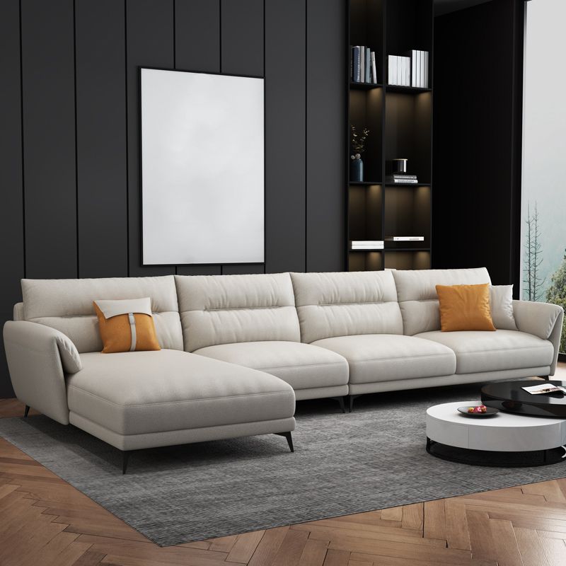 Contemporary 4-Seater Sectional with Pillow Top Arms in Faux Leather
