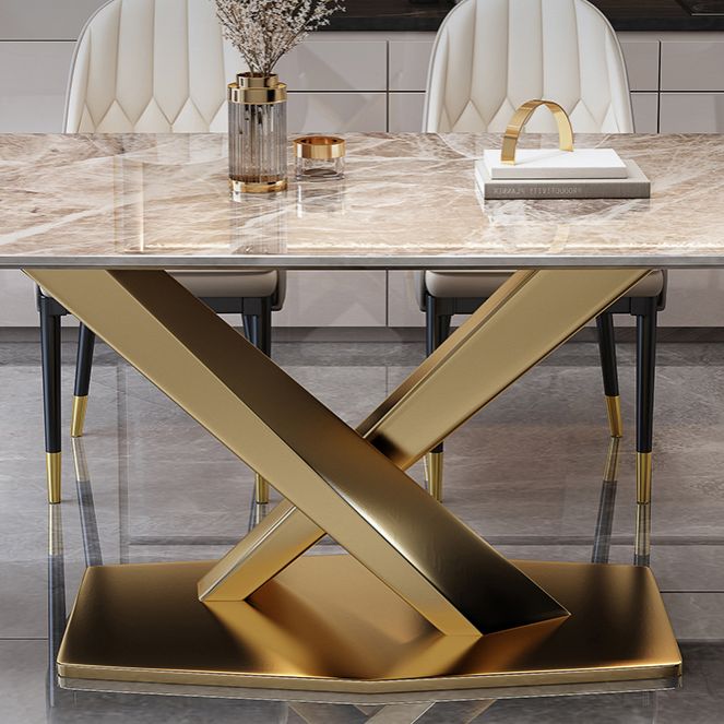 Style minimaliste Ensemble de salle à manger en pierre fritté avec table fixe et base de chevalets en or pour un usage domestique