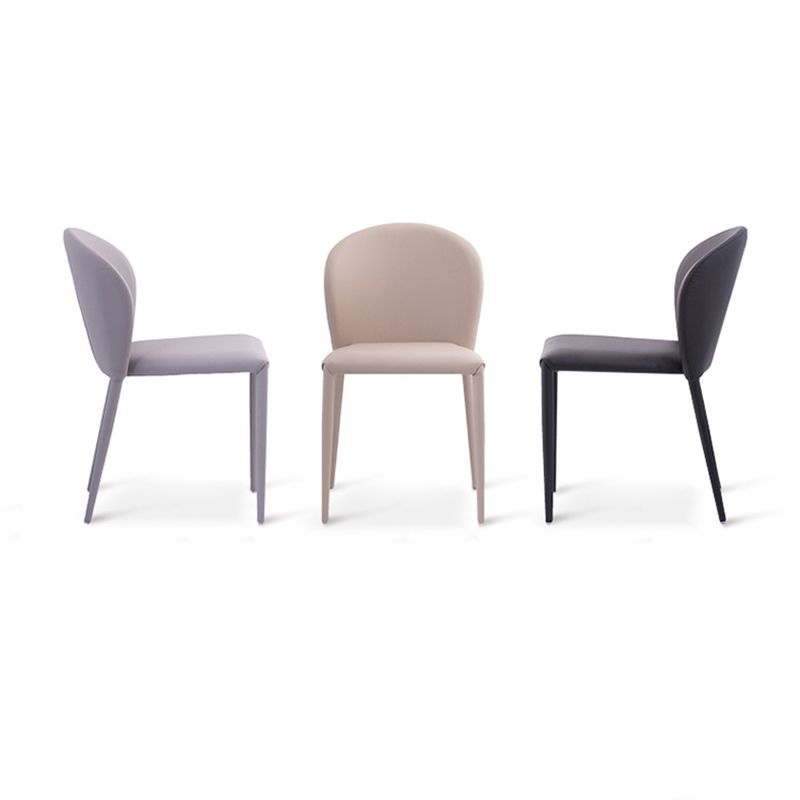 Minimalistische stijl armloze vaste achterzijde stoelen lederen eetkamerstoelen voor thuis
