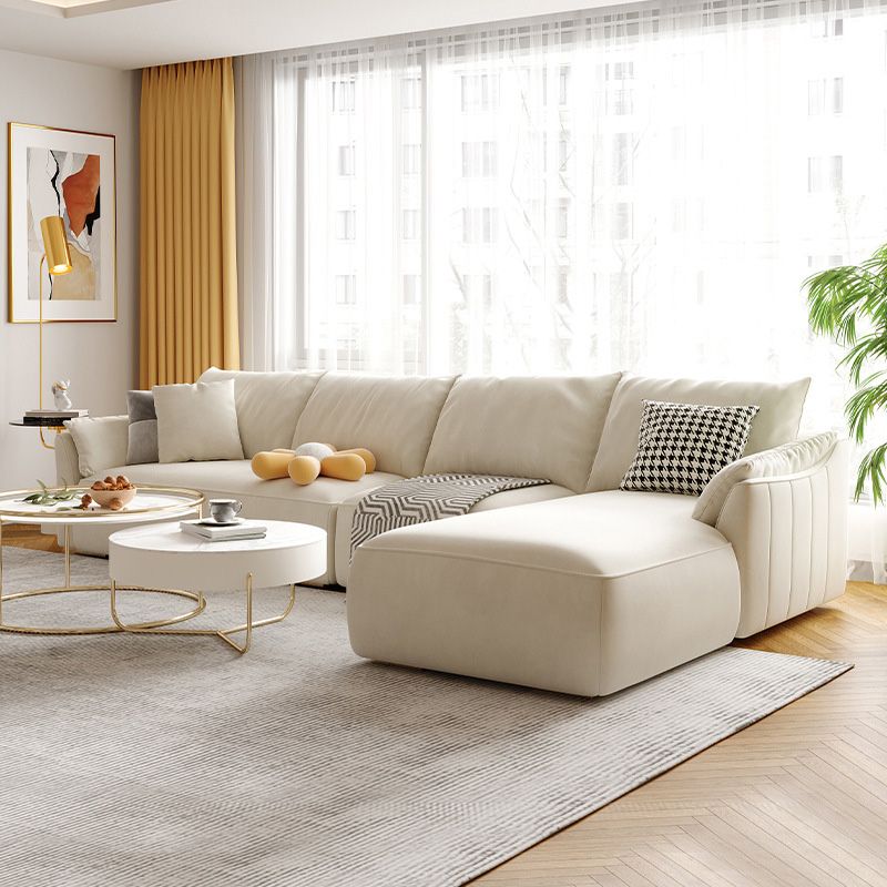 Beige Pillow Back Sectional with Flared Arm for Apartment and Living Room