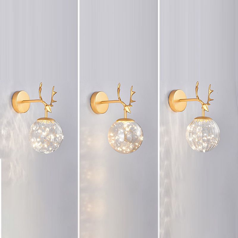 Glass Globe Wall Sconce in Modern Luxury Style Wrought Iron Wall Lamp with Antler Decoration