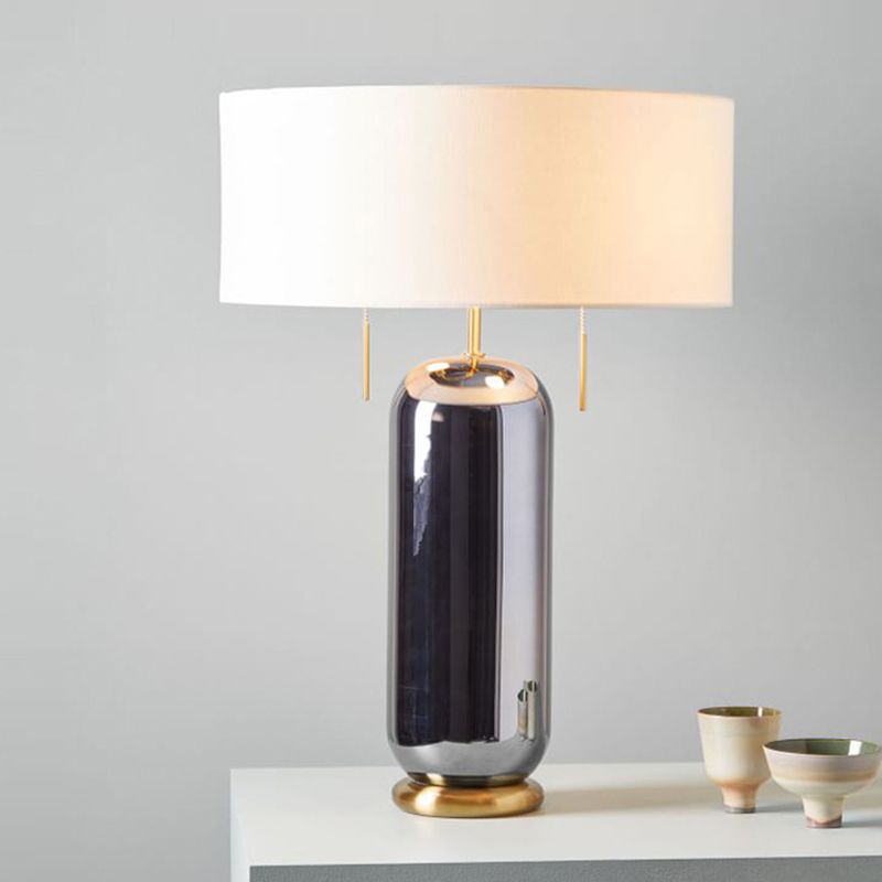 Lámpara de vidrio ovalado de vidrio ovalado 1 luz de mesa de bulbo con sombra redonda de tela en blanco