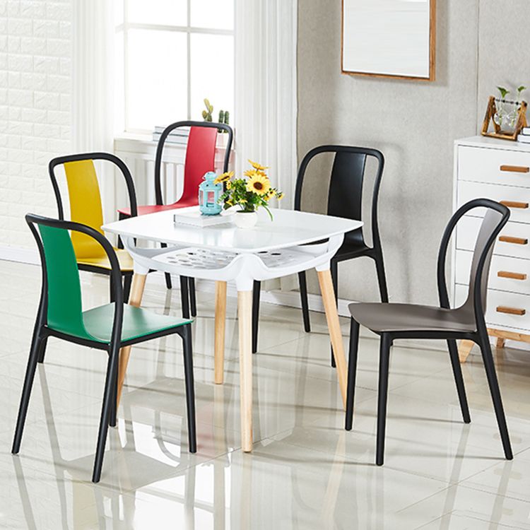 Scandinavian Armless Dining Chairs Plastic Slat Back Side Chairs with Black Legs