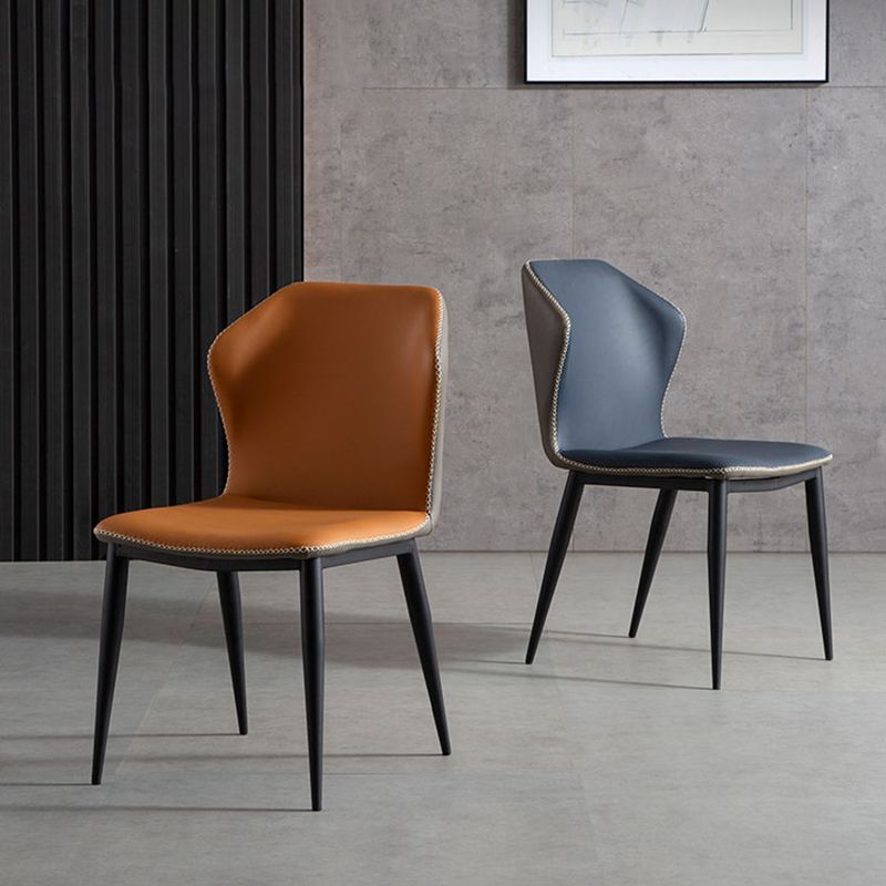 Silla moderna del comedor del metal Silla sin brazos Wingback para el restaurante