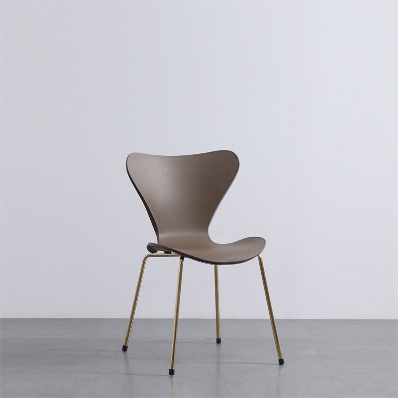 Sillas laterales sin brazos modernas con 4 patas de acabado negro sillas sólidas de plástico para uso doméstico