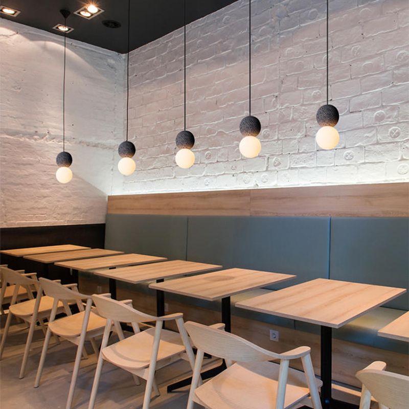Moderne artistieke indoor hanger lichte cementbolhangenlamp met witte glazen schaduw