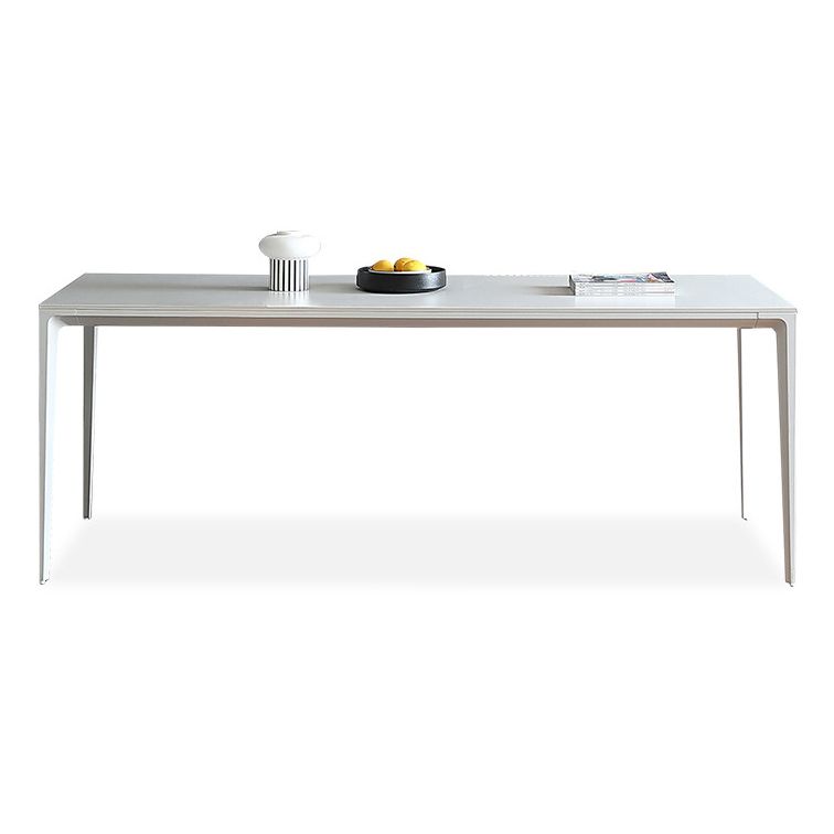 Table à manger rectangulaire contemporaine en métal blanc table de pierre fritrée avec des jambes métalliques