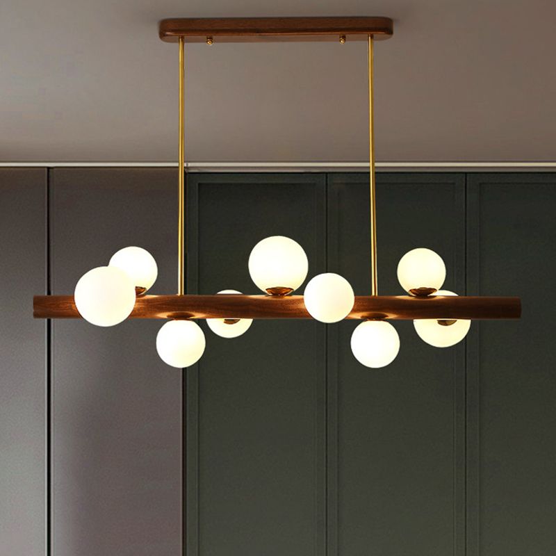 Luces colgantes de restaurantes de múltiples cabezas de madera moderna con sombra de vidrio de globo